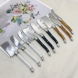 Diverse stainless steel cheese and butter knife set with elegant riveted handles.