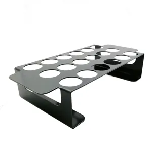 Detailed view of the 18-hole black non-stick jalapeño grill rack for outdoor BBQ camping