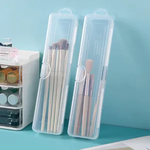 Tragbare und staubdichte transparente Aufbewahrungsboxen für Make-up-Pinsel auf Tisch