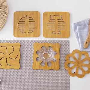 Heat resistant hollow carved wooden coasters set with cute cartoon animal patterns