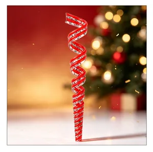 Detailed close-up of a red and white spiral Christmas ornament with sparkling glitter