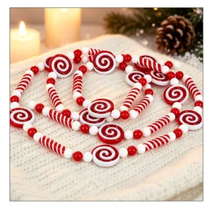 Detail showing red and white peppermint swirl candy bead garland for Christmas decor