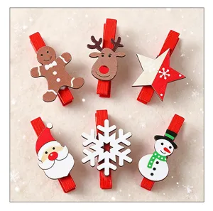Set of 6 decorative Christmas wooden clips with reindeer, snowman and Santa Claus designs