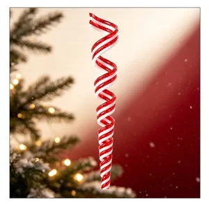Detailed view of red and white spiral candy cane Christmas ornament with glitter.