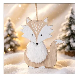 Close-up detail of a wooden fox Christmas ornament featuring soft white plush fur