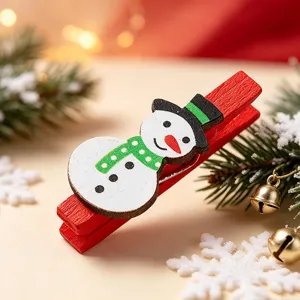 Decorative red wooden Christmas clip with cute snowman design for festive photo hanging