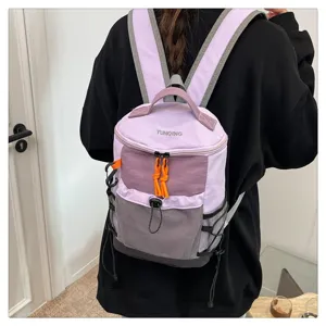 Detailed view of lavender functional backpack with orange drawstring accents