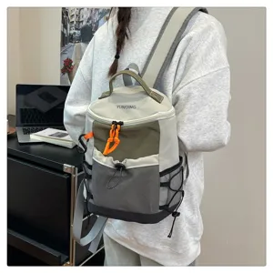 Macro view of functional hiking backpack featuring mesh pockets and drawstring detail