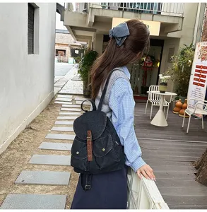 Casual black denim backpack for women with large capacity school bag and buckle details