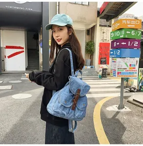 Stylish blue denim backpack for women, casual high-capacity schoolbag lifestyle shot