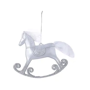 Silver rocking horse Christmas ornament with glitter and white fur details on white background.