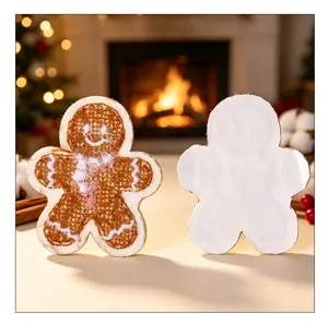 Detailed view of gingerbread man towel embroidery patches with front and back texture