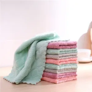 Close-up view of stacked soft microfiber kitchen cleaning cloths in pastel colors