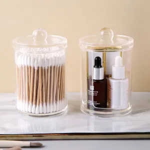 Elegant clear acrylic dustproof storage jars for cotton swabs and cosmetic pads.