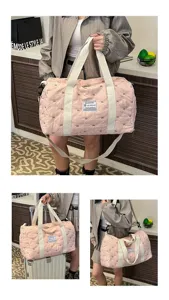 Quilted lightweight travel duffel bag with bow pattern, stylish crossbody fitness handbag.