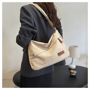 Sac à bandoulière beige en toile de grande capacité pour femmes et hommes, chic