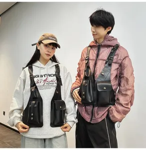 Detail of black faux leather tactical vest bag on male and female fashion models