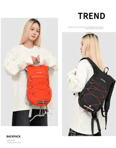 Detail view of lightweight outdoor running backpacks in orange and black colors