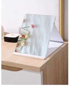 Minimalist portable white folding desktop makeup mirror with standing triangular base