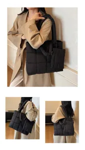 Stijlvolle zwarte gewatteerde puffer tote bag met bijpassend etui op een model nu