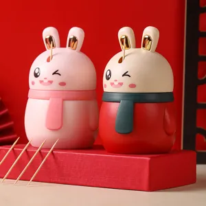 Cute rabbit-shaped automatic pop-up toothpick holder in pink and red for home decor