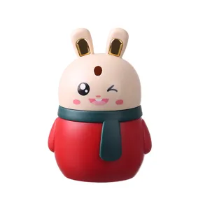 Automatic pop-up toothpick box featuring a cute cartoon rabbit design in red and green