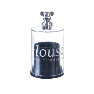 Luxury clear cotton swab holder with a decorative silver bear lid and black inner container