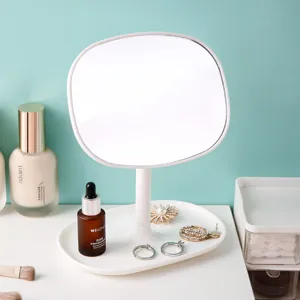 Elegant white desktop makeup mirror with a storage tray base and rounded square design