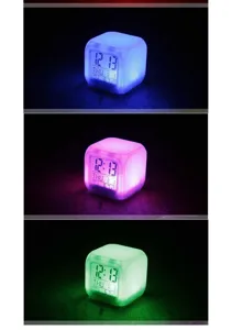 Detail view of the cube LED digital alarm clock showing color changing transitions.