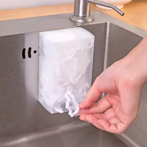 Frosted wall-mounted storage box for kitchen sink filter mesh bags in use detail view