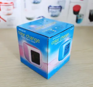 Retail packaging of a glowing color changing LED digital alarm clock for office desk