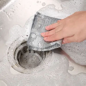 Silver wire mesh cleaning cloth for kitchen sink scrubbing with soap foam