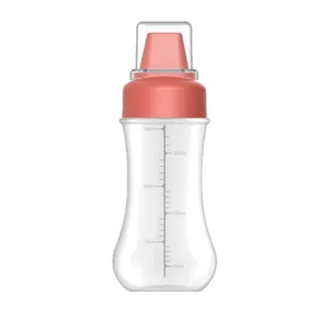 Transparent PE squeeze condiment bottle with 280ml measurement scale and coral cap.
