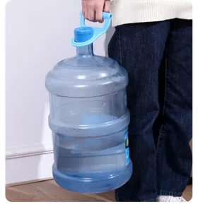 Manually lifting a large blue water jug using a sturdy blue ergonomic handle carrier