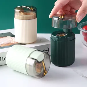 Elegant portable press-type toothpick dispenser with vertical stripes and clear lid