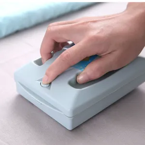 Spazzola manuale a doppio rullo per la polvere per tappeti e rimozione pelucchi
