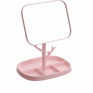 Specchio per trucco rosa con supporto a forma di albero e base portaoggetti