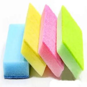 Set of four colorful double-sided sponges for kitchen cleaning and dishwashing tasks.