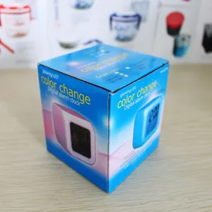 Cubic LED color changing digital alarm clock for bedside table in retail packaging
