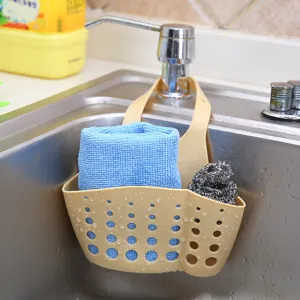 Pratico organizer beige regolabile da appendere al lavandino per spugne e drenaggio cucina.