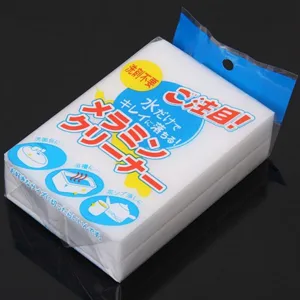 White melamine magic eraser sponge in transparent packaging for kitchen cleaning tasks