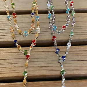 Detailed view of two double-layer Y-shaped necklaces with vibrant colored crystal beads