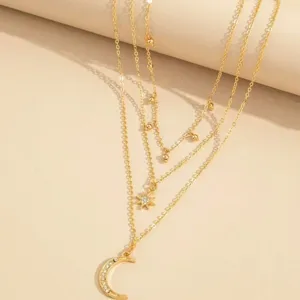 Elegante collana a strati dorata con ciondoli a luna e stella con strass per donna
