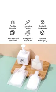 Detailed view of portable liquid refill pouches and pump bottle on a wooden tray