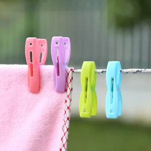 Set of colorful plastic windproof clothespins for outdoor laundry and drying clothes