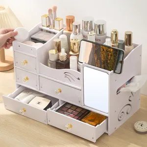 Grande organizzatore di cosmetici bianco con specchio e supporto telefono da tavolo.