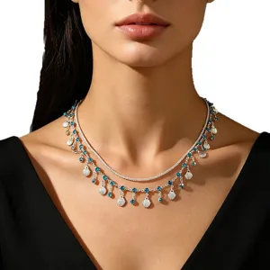 Elegant double-layered necklace featuring blue rhinestones and silver shell tassels.