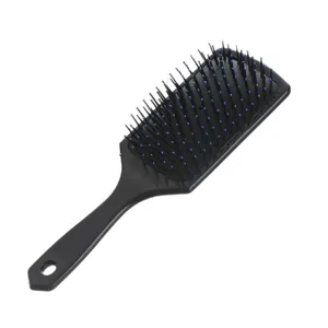Professional anti-static black paddle hairbrush with massaging blue-tipped bristles
