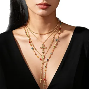 Elegant multi-layered gold cross pendant Y-necklace with colorful beads on model