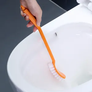 Durable orange plastic toilet brush with long ergonomic handle for bathroom cleaning